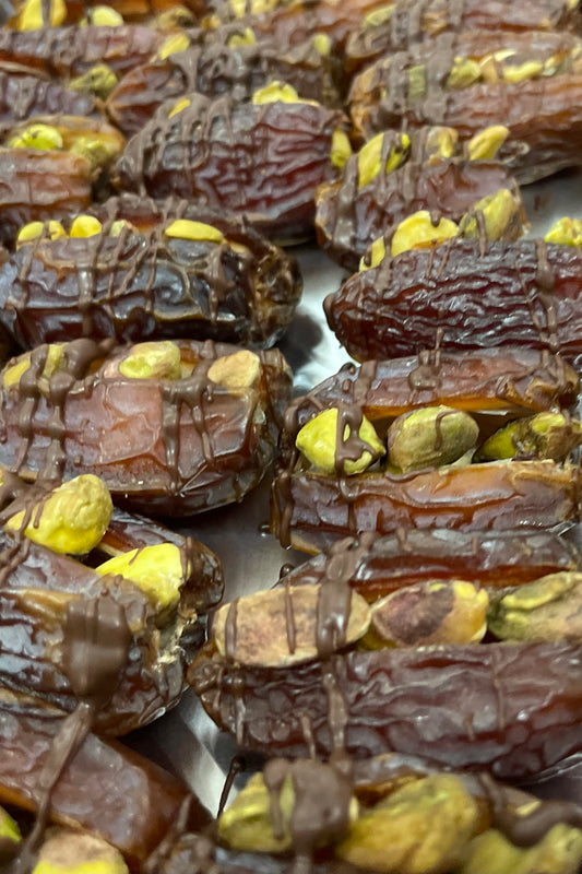 Pistachio Dates with dark chocolate drizzle